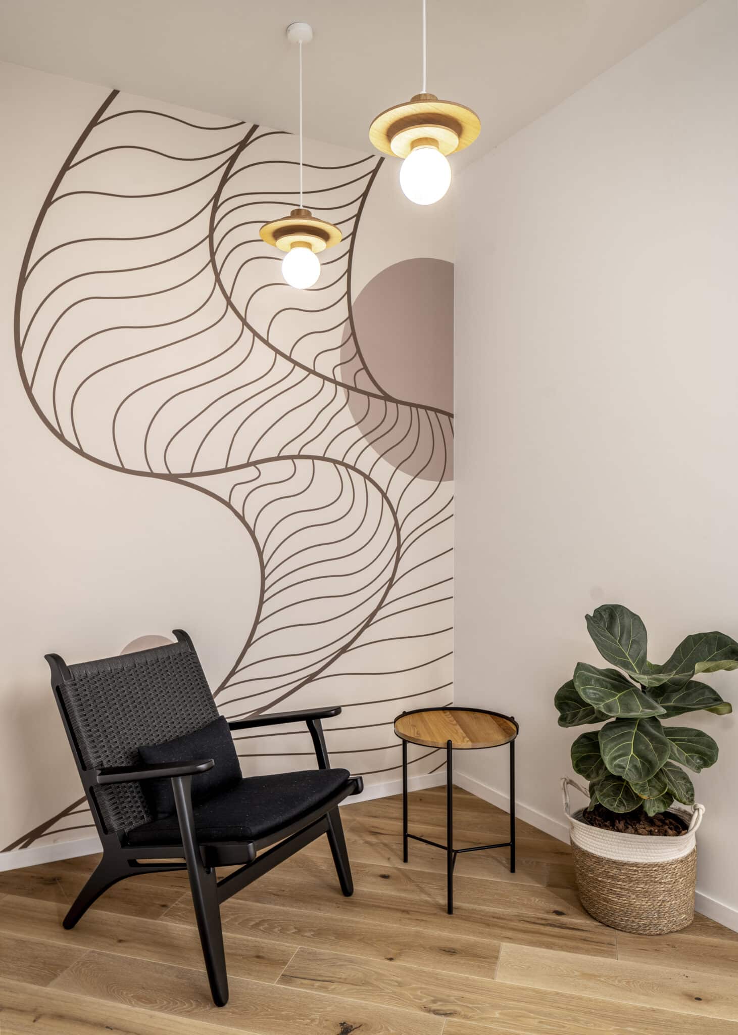 Large flowing line wall graphic in a lounge corner