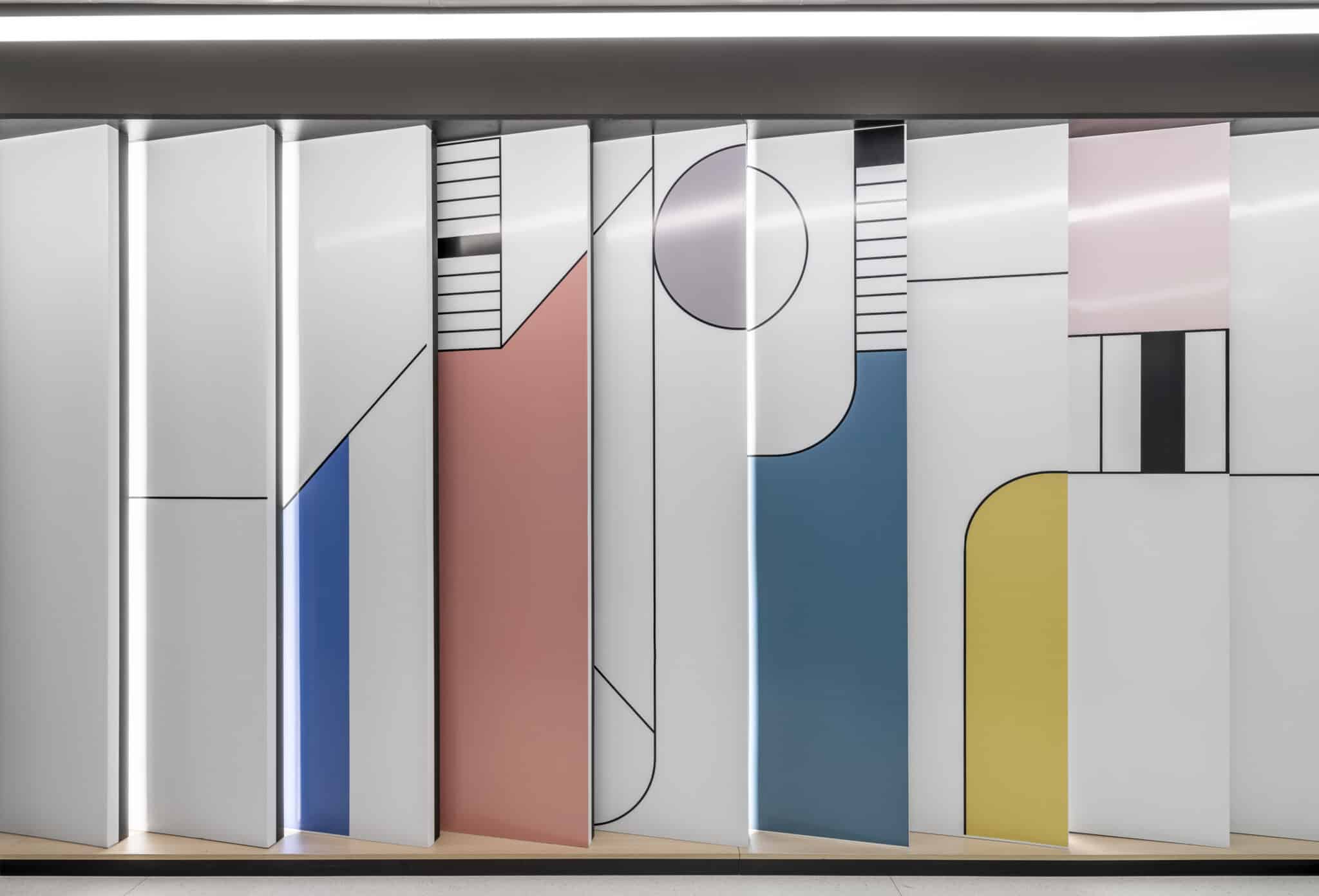 Angled 3D panels with coloured geometric graphics