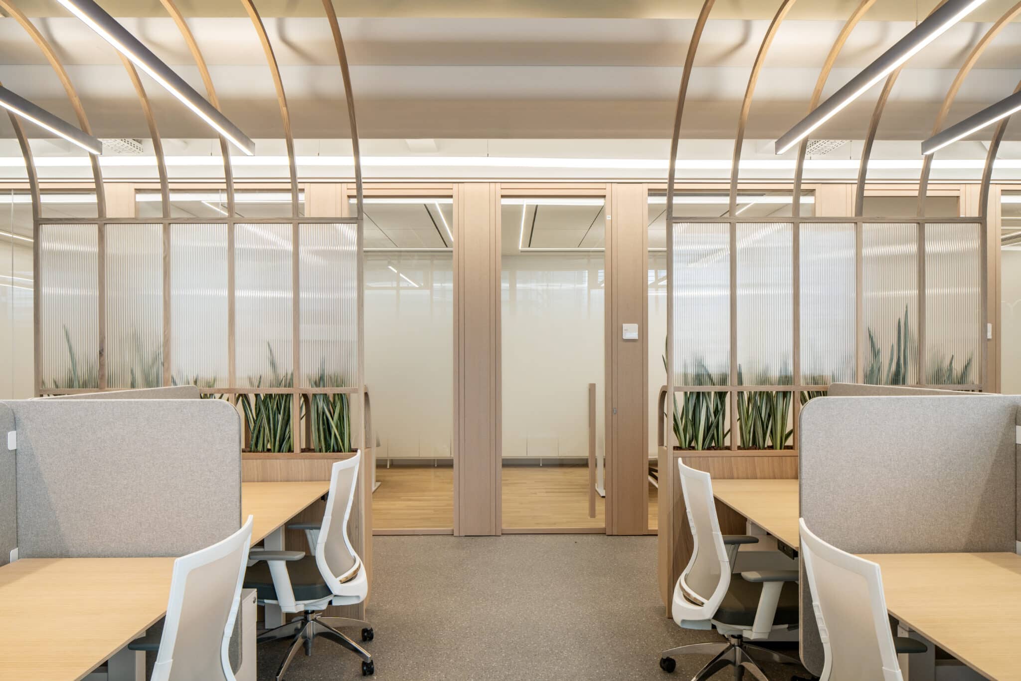 Fluted glass film on the partitions around office desks