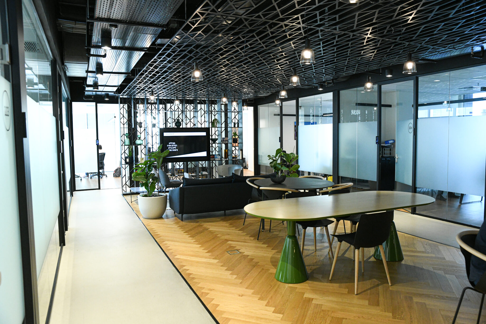 Frosted glass film and room number signage in an open lounge