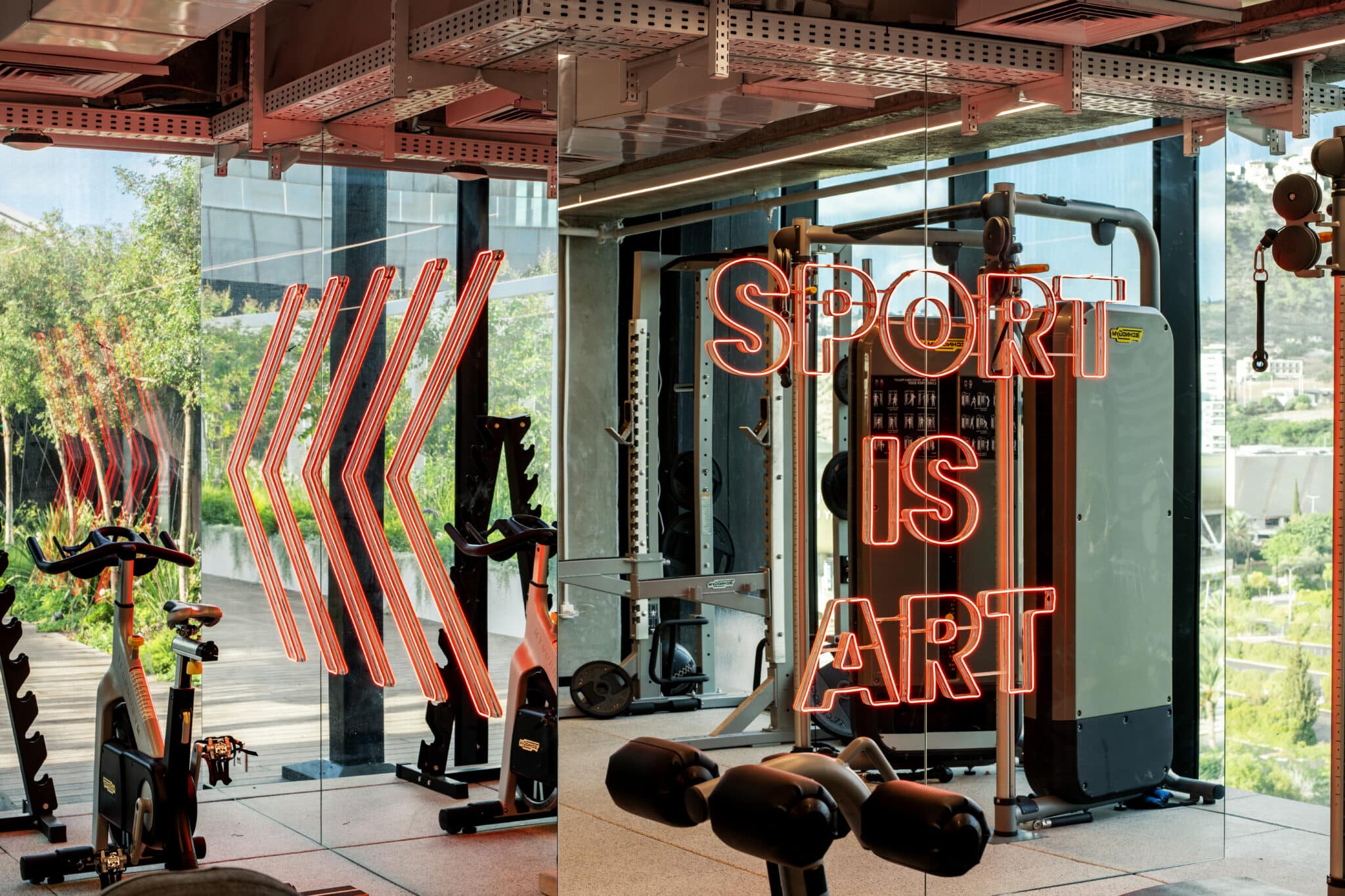 SPORT IS ART neon sign in the office gym