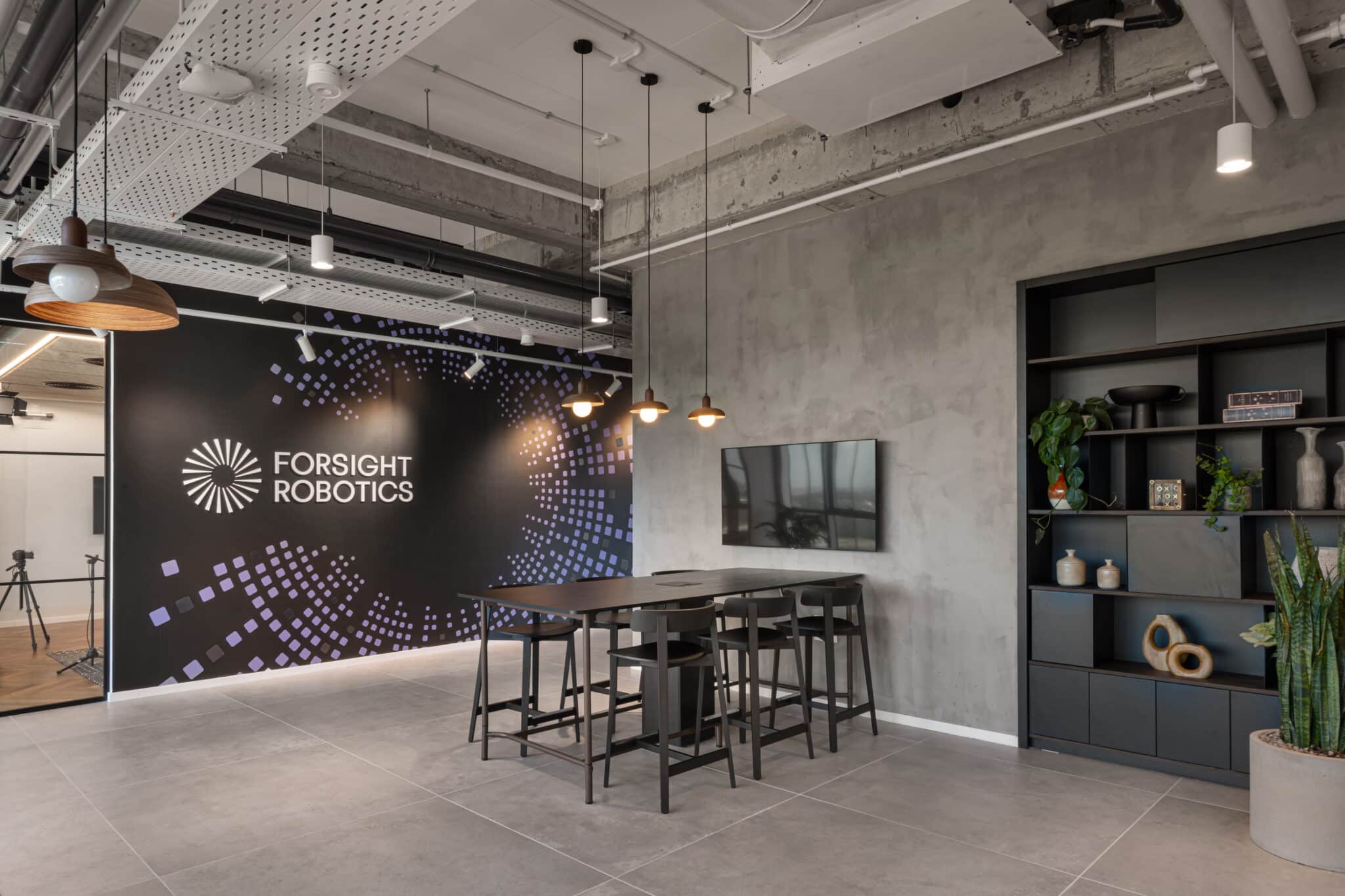 Forsight Robotics logo on a dark dot-pattern graphic wall