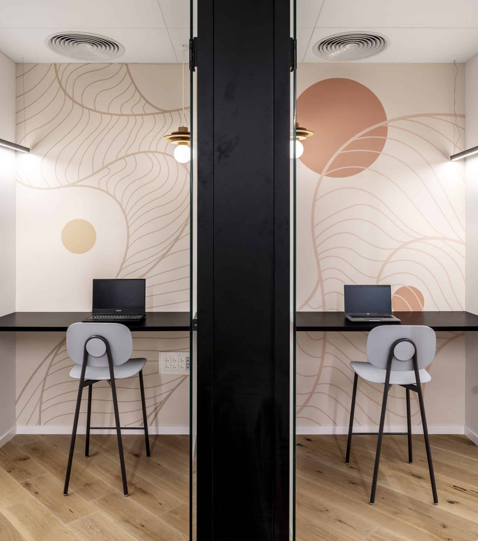Line graphics printed inside two phone booths