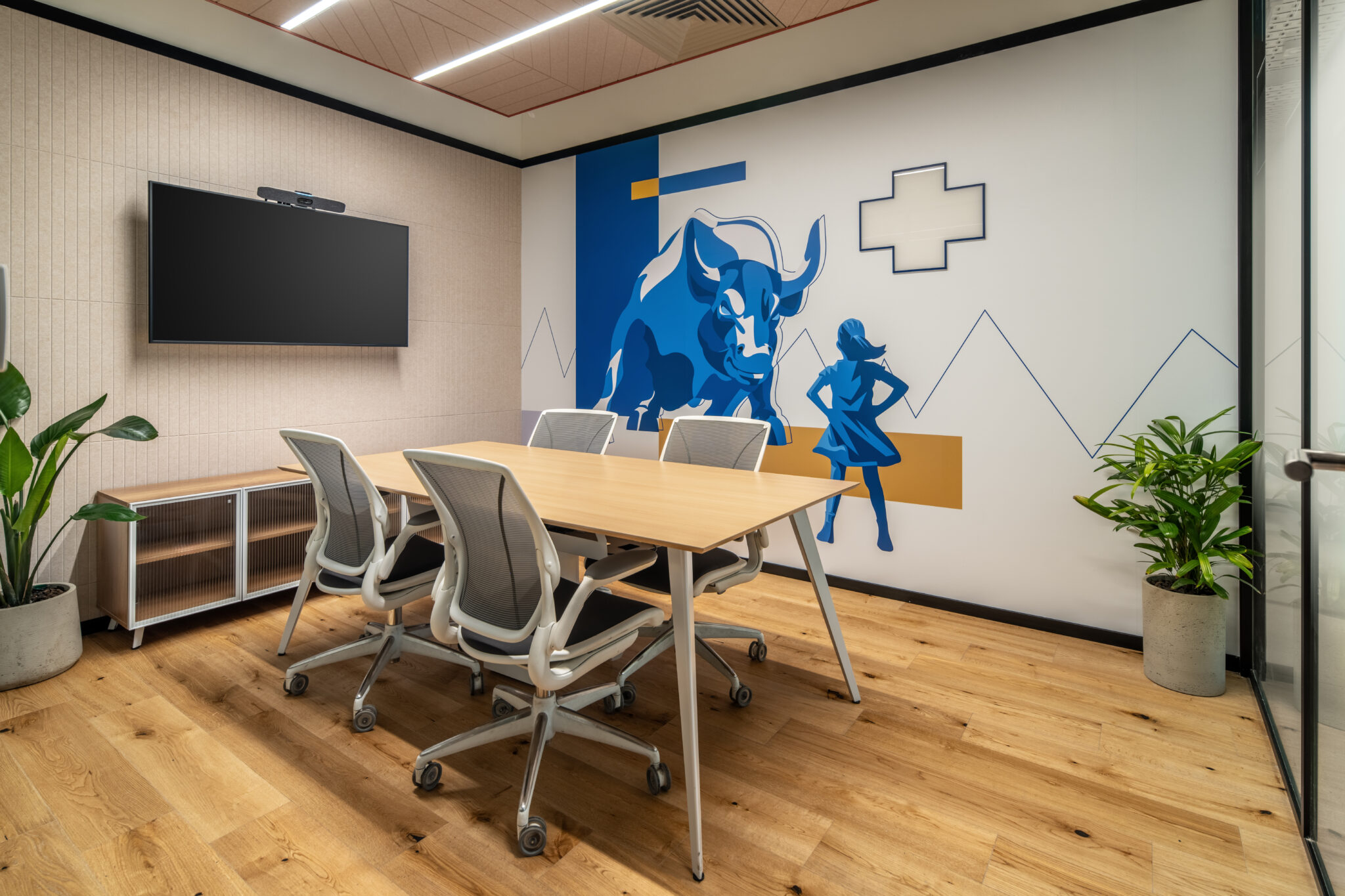 Blue bull wall graphic in a meeting room
