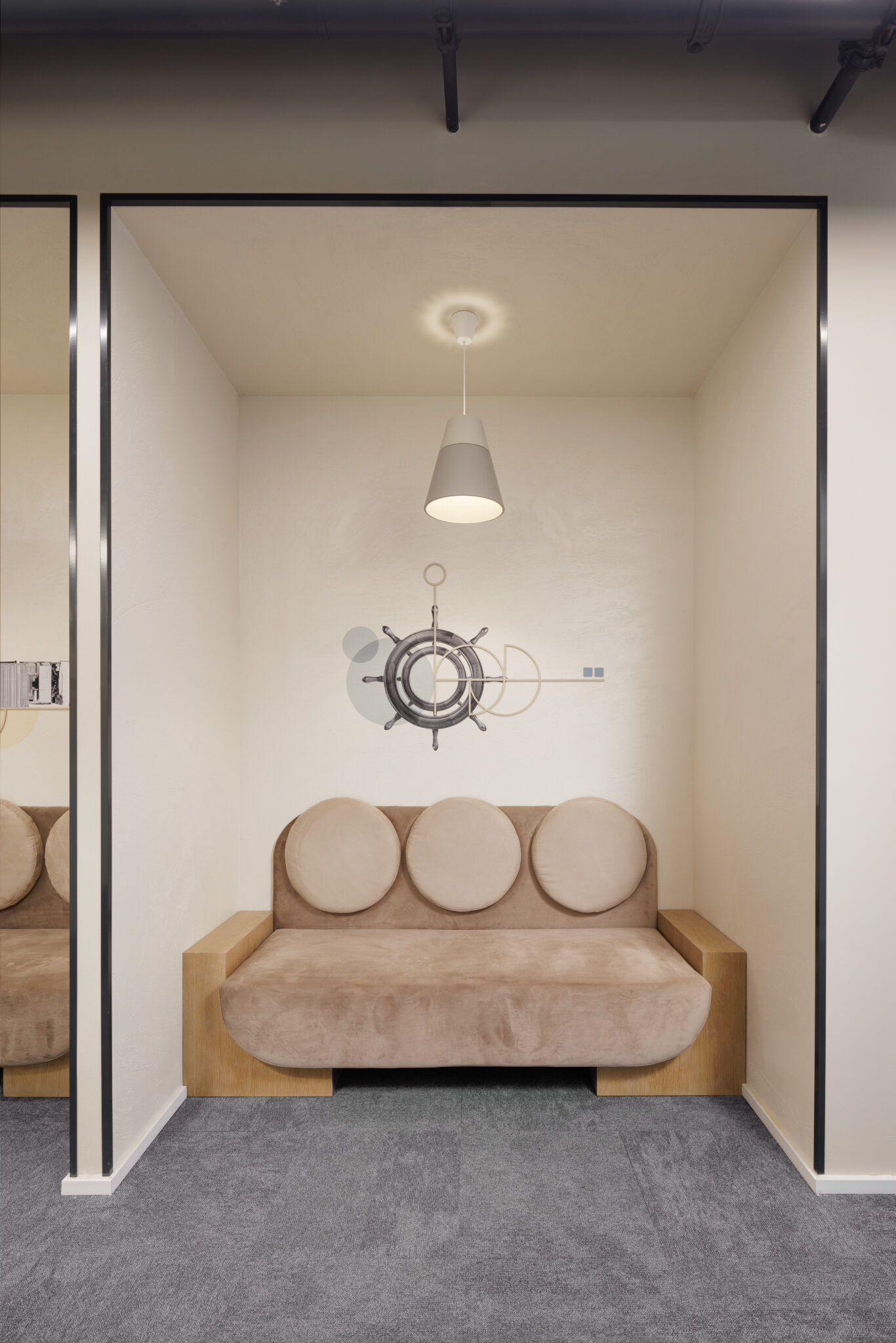 Seating niche with ship wheel wall graphic