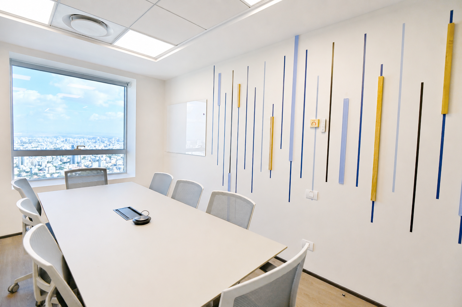 Meeting room with blue, yellow and black vertical line wall graphic
