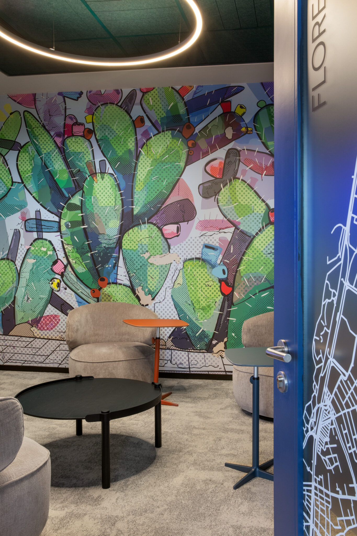 Lounge with a colourful cactus pop art wall mural