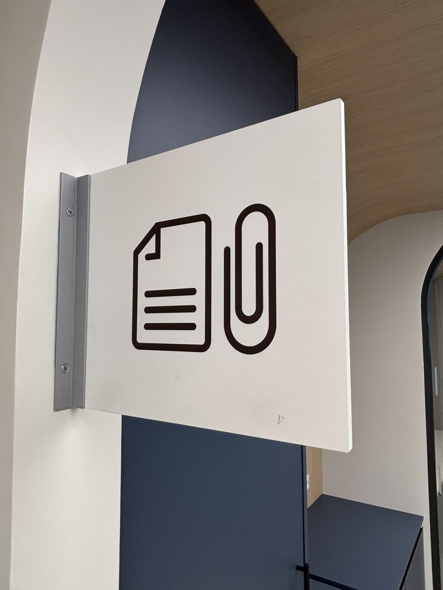 Hanging copy room sign with document and paper clip icon