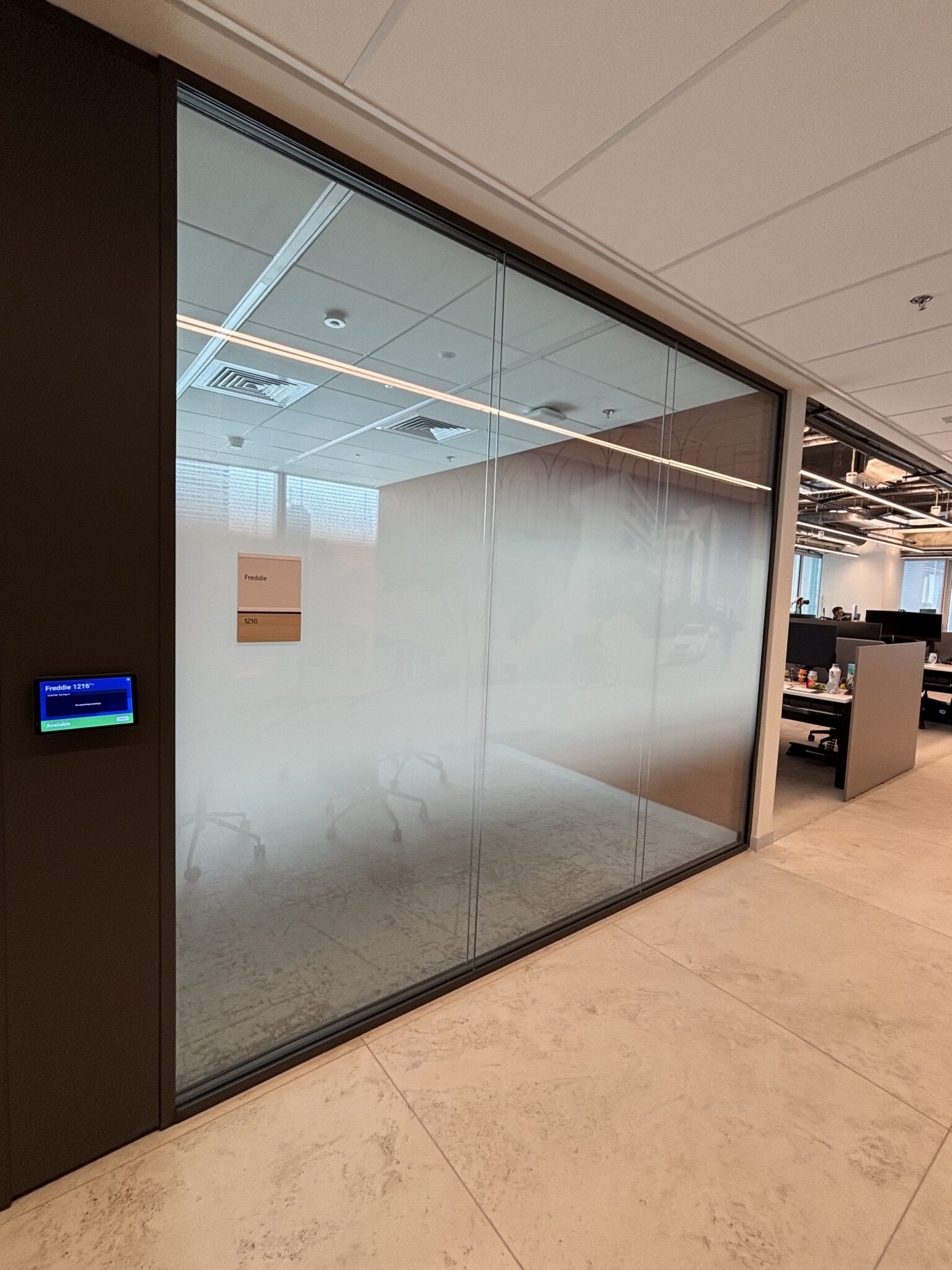 Glass meeting room with frosted gradient film