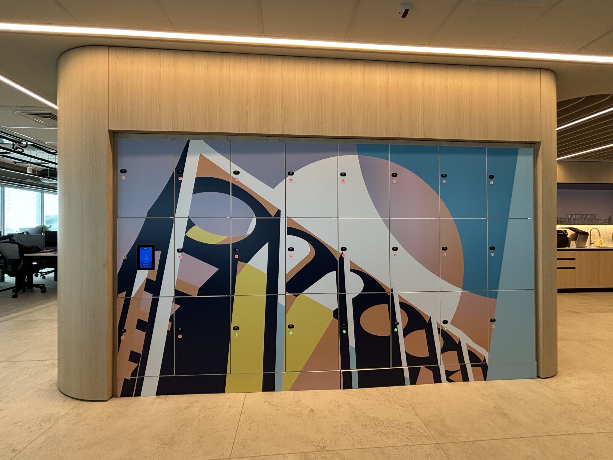 Colourful abstract graphic printed on a wall of lockers